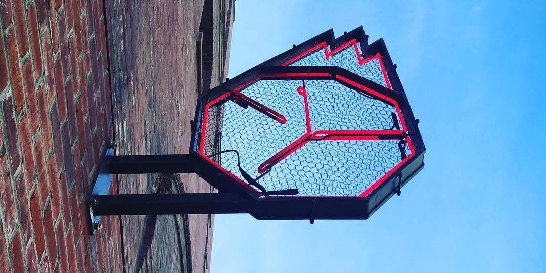 Earthbound Beers neon sign at their brewery on Cherokee Street.