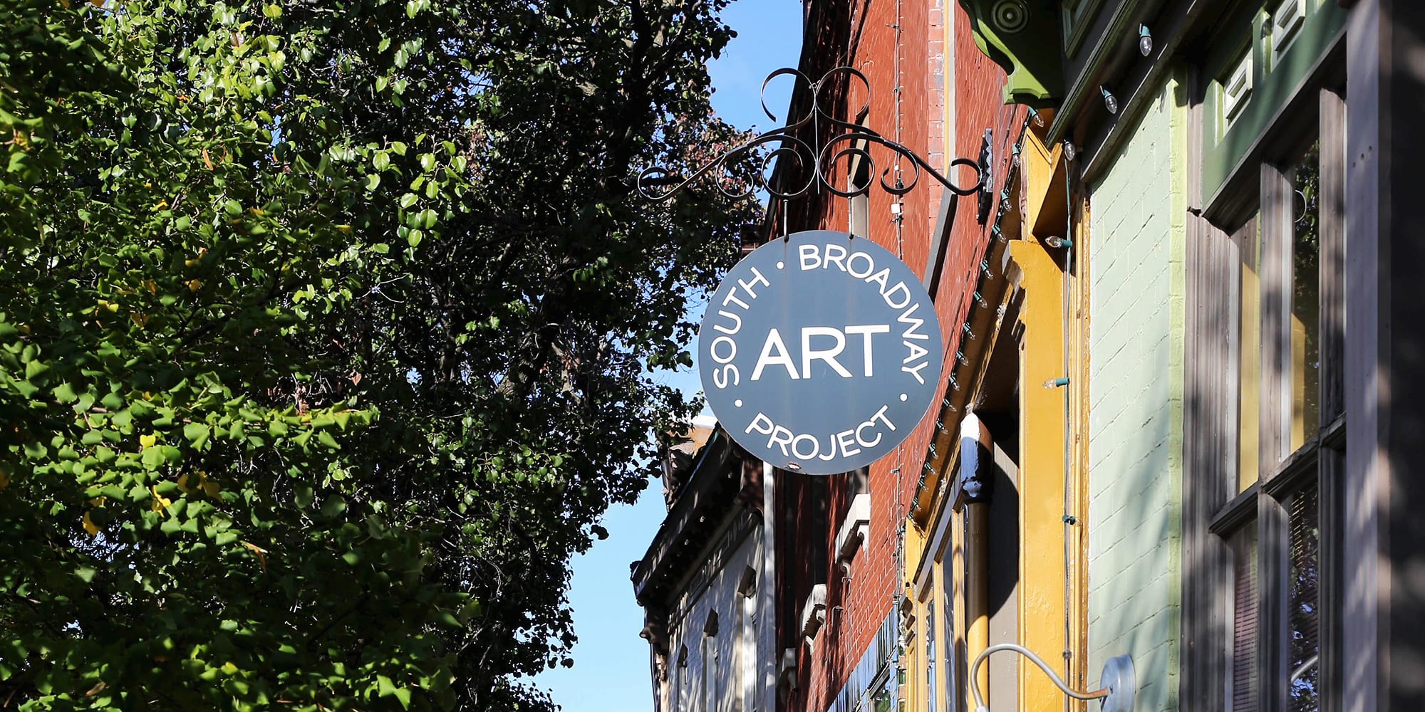 South Broadway Art Project's storefront and sign. Photo by Paul Sableman.