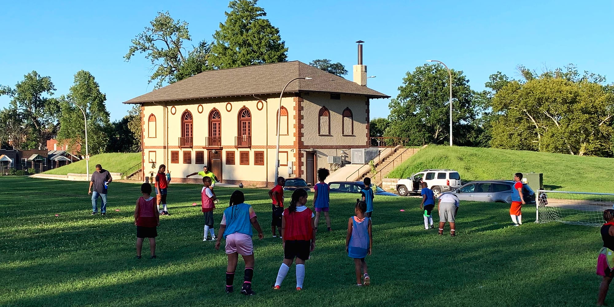 Children playing soccer at Marquette Park in Dutchtown.