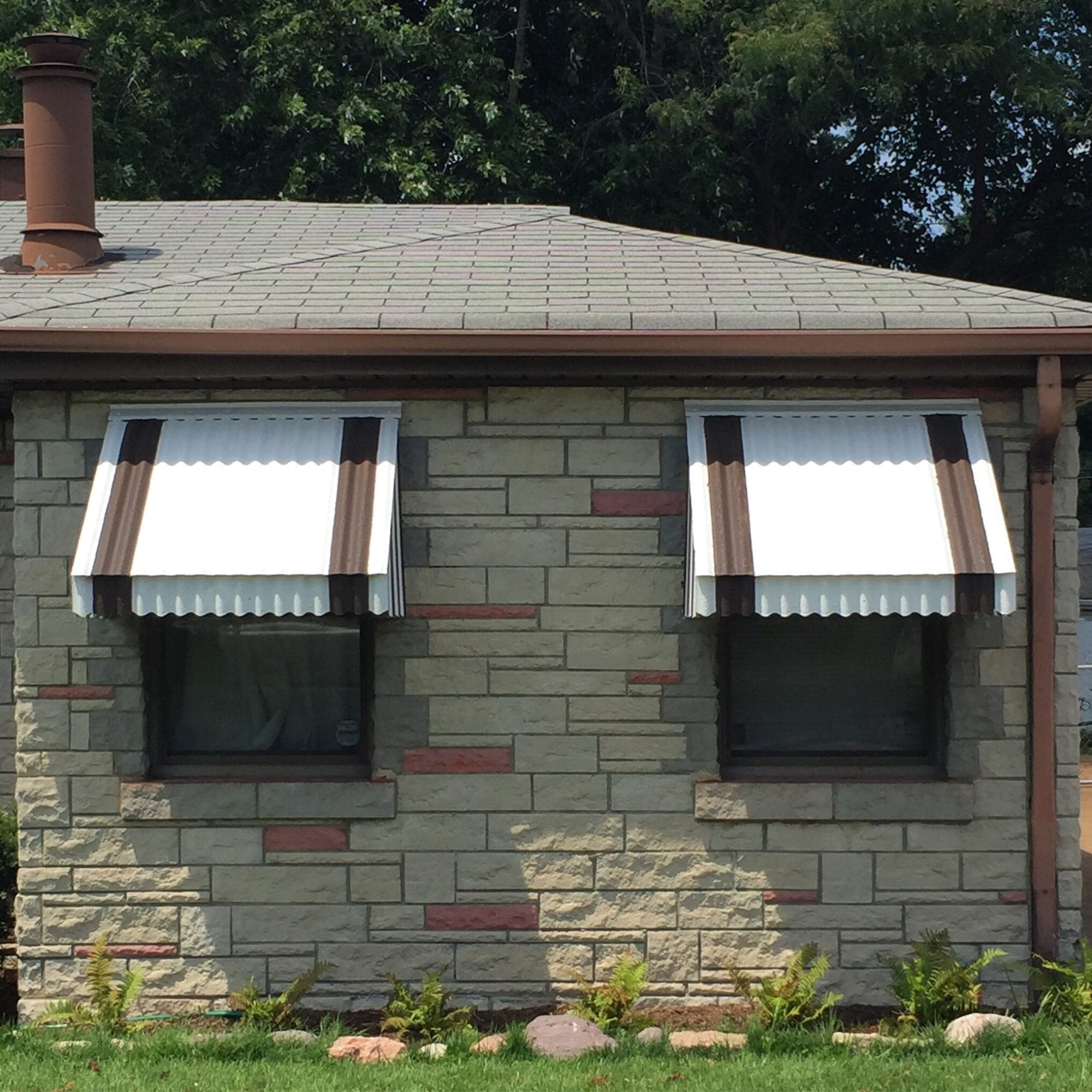 Metal awnings and Permastone on a home in Dutchtown, St. Louis. Photo by Josh Burbridge.
