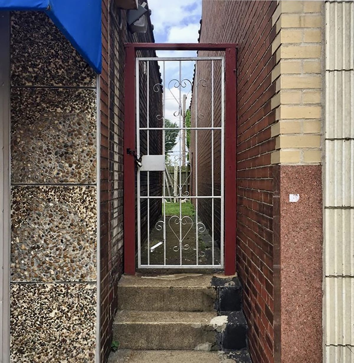 Gate on Meramec Street in Dutchtown, St. Louis. Photo by Josh Burbridge.