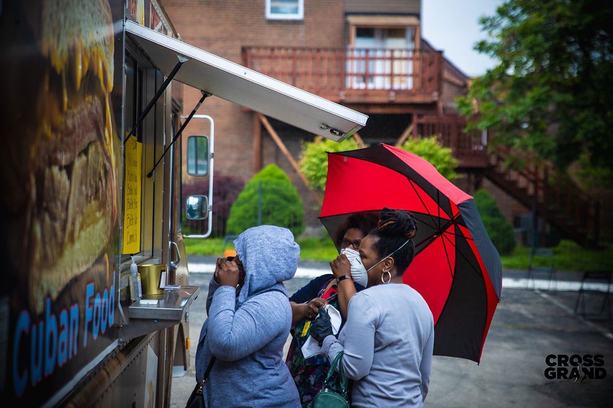 Dutchtown neighbors wearing masks at DT2 After Hours in Downtown Dutchtown. Photo by Chip Smith of Cross Grand.