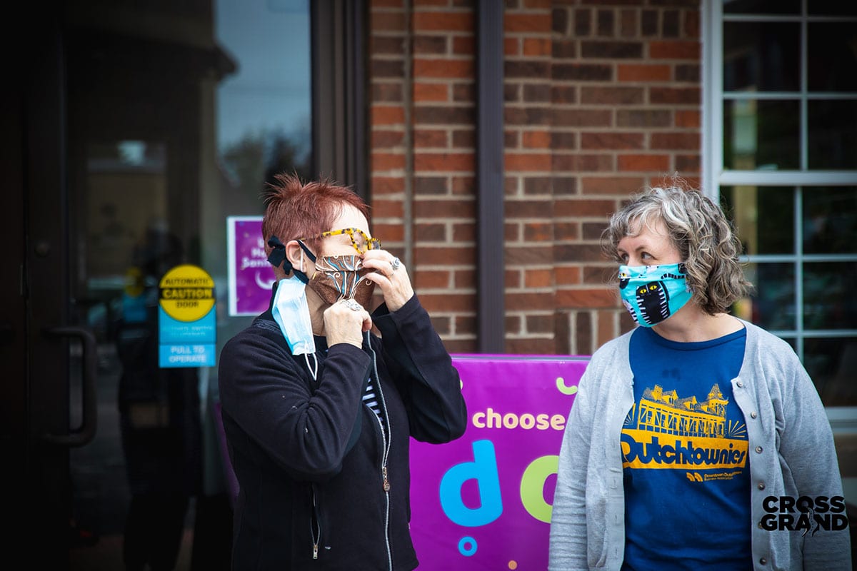 Dutchtown neighbors wearing masks at DT2 After Hours in Downtown Dutchtown. Photo by Chip Smith of Cross Grand.