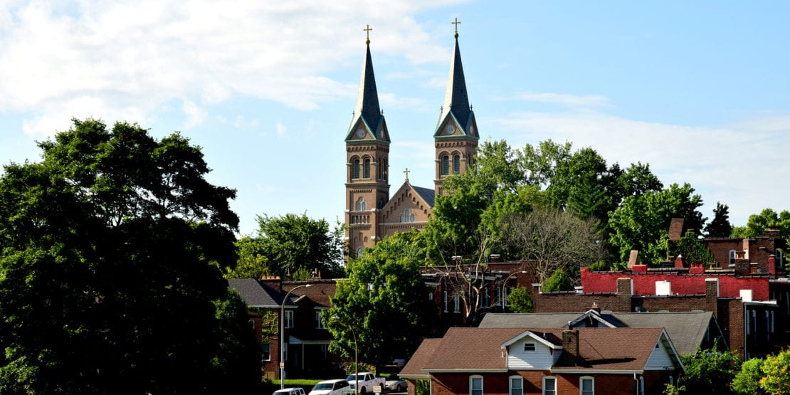 The steeples of St. Anthony of Padua seen from Marquette Park in Dutchtown, St. Louis.