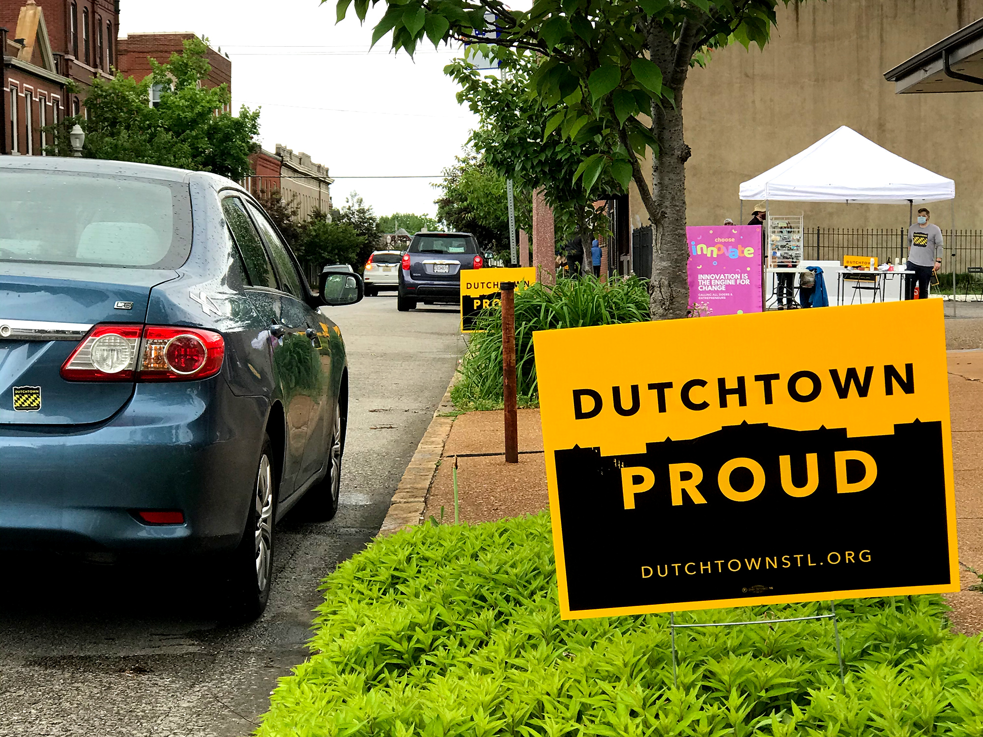 Dutchtown Proud signs in front of the Neighborhood Innovation Center in Downtown Dutchtown.