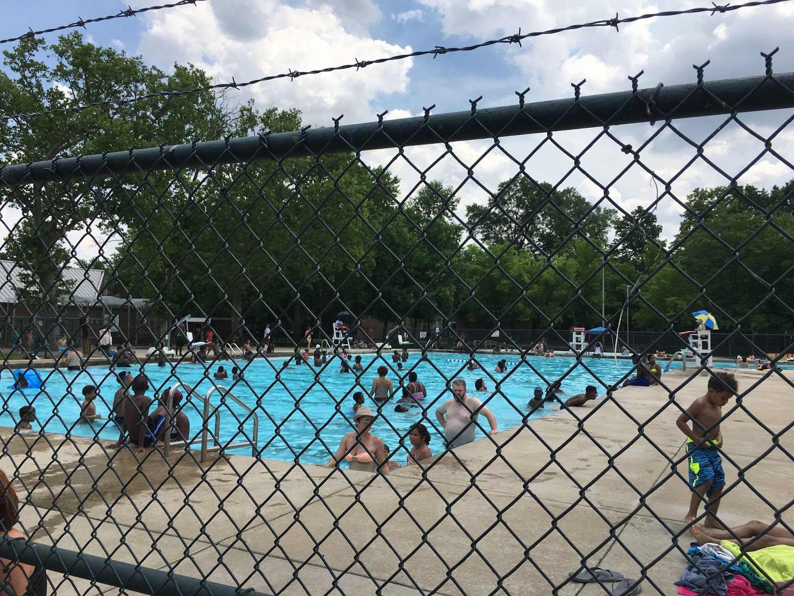 Barbed wire around the Marquette Park Pool.