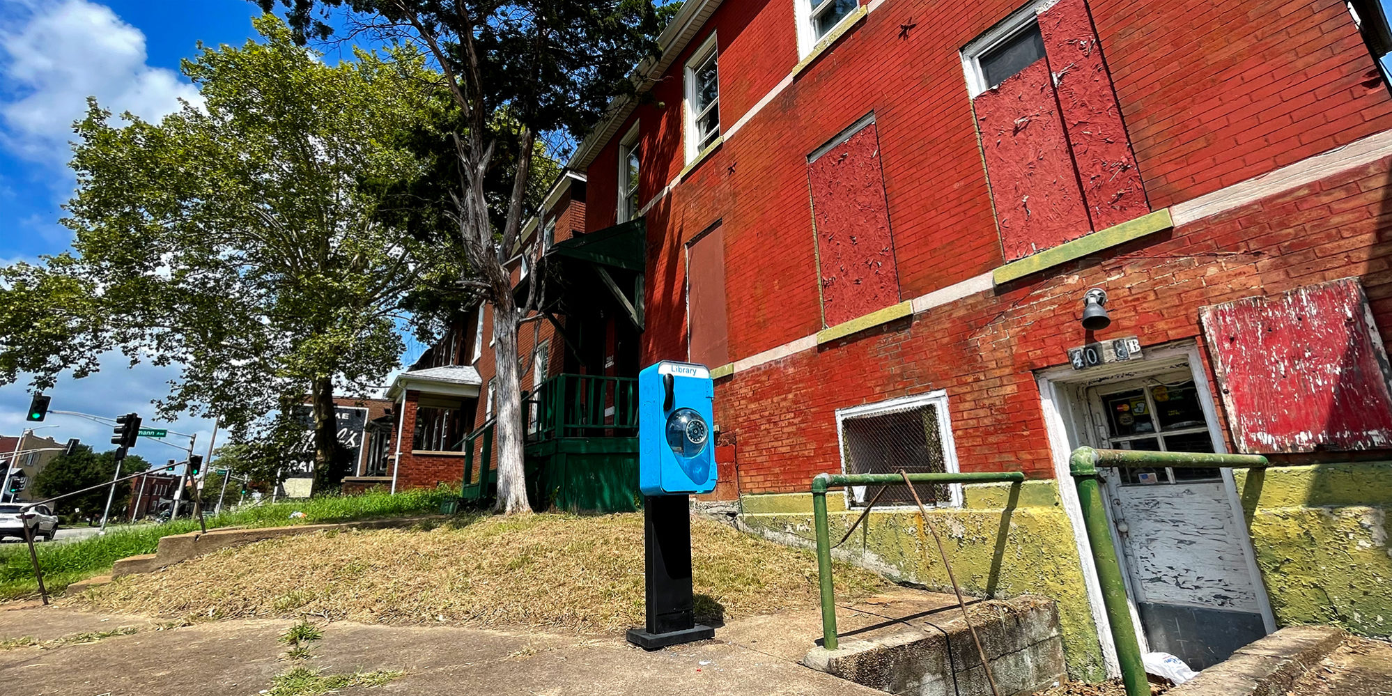 A pay phone converted to a free little library in Dutchtown, St Louis, MO.